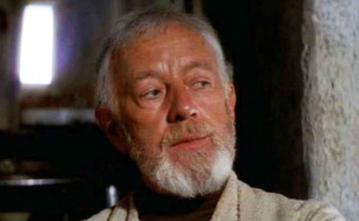 Ben Kenobi from Star Wars: A New Hope. Ben has a grey beard and grey hair.