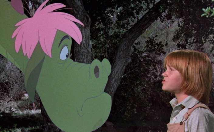 A scene from the film Pete's Dragon. The dragon is green and has pink wings.